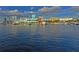 Scenic waterfront view with boats docked and city skyline, offering a vibrant and attractive coastal setting at 631 N Orange Ave # 208, Sarasota, FL 34236
