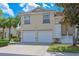 Charming two-story condo featuring a tile roof, a two car garage and a well maintained lawn in a great neighborhood at 6335 Bay Cedar Ln, Bradenton, FL 34203