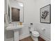 Elegant powder room featuring modern fixtures and stylish decor at 6349 Isla Del Ray Ave, Sarasota, FL 34240