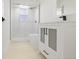 Modern bathroom featuring a walk-in shower, vanity with cabinet, and sleek fixtures at 6572 Mauna Loa Blvd, Sarasota, FL 34241