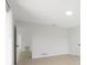 A bright and airy bedroom features light wood floors, neutral paint and lots of natural light at 6572 Mauna Loa Blvd, Sarasota, FL 34241