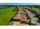 Aerial view of the community showcasing the well-manicured landscaping and golf course at 7106 Grand Estuary Trl # 102, Bradenton, FL 34212