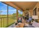 Spacious screened lanai features both living and dining spaces and panoramic views at 7106 Grand Estuary Trl # 102, Bradenton, FL 34212