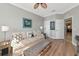 Cozy living room showcases seating, entertainment center, and neutral walls at 7106 Grand Estuary Trl # 102, Bradenton, FL 34212