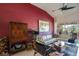 Inviting living room with a cozy L-shaped sofa, modern coffee table, and access to outdoor patio at 7155 Boca Grove Place Pl # 202, Lakewood Ranch, FL 34202