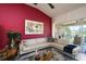 Bright living room with modern decor, stylish furniture, and a sliding glass door to the outdoor area at 7155 Boca Grove Place Pl # 202, Lakewood Ranch, FL 34202