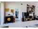 Living room showcasing contemporary decor, stylish furniture, and an open doorway to another room at 7155 Boca Grove Place Pl # 202, Lakewood Ranch, FL 34202