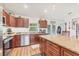 Kitchen with granite counters, a stainless steel dishwasher, and ample cabinet space at 7745 Wauchula Rd, Myakka City, FL 34251
