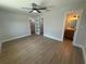 Bedroom with tile floors, ceiling fan, leading to bathroom and closet at 808 25Th W Ave, Palmetto, FL 34221