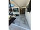 Inviting front porch with tiled flooring and a wooden door, enhanced by sleek black window trim at 808 25Th W Ave, Palmetto, FL 34221