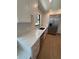 Kitchen featuring white cabinetry, stainless steel appliances, and sleek quartz countertops at 808 25Th W Ave, Palmetto, FL 34221