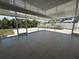 Large screened patio featuring tile floor and a view of the canal at 808 25Th W Ave, Palmetto, FL 34221