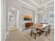 Formal dining room with elegant lighting and plantation shutters at 8312 Catamaran Cir, Lakewood Ranch, FL 34202