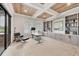 Bright office space with custom built-ins, a wood ceiling, and ample natural light at 8312 Catamaran Cir, Lakewood Ranch, FL 34202