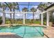 Beautiful screened in pool with spa and serene landscaping at 8312 Catamaran Cir, Lakewood Ranch, FL 34202