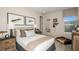Cozy bedroom features a comfortable bed, bedside tables, and fishing-themed decor at 8583 Big Dipper Dr, Sarasota, FL 34241