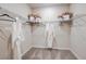 Spacious walk-in closet with wire shelving and space for storage and organization at 8583 Big Dipper Dr, Sarasota, FL 34241
