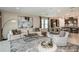 Open-concept living space featuring stylish decor, neutral colors, and a spacious layout at 8583 Big Dipper Dr, Sarasota, FL 34241