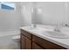 Spacious bathroom with double sinks, ample counter space, and a bathtub at 8632 Snowfall St, Sarasota, FL 34241