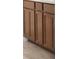 Close up of a brown kitchen cabinet at 8632 Snowfall St, Sarasota, FL 34241
