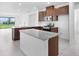 Kitchen with granite countertops, stainless steel appliances, a kitchen island and stainless steel dishwasher at 8632 Snowfall St, Sarasota, FL 34241