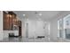 Modern kitchen featuring granite countertops, stainless steel appliances, and ample cabinet space at 8632 Snowfall St, Sarasota, FL 34241