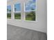 This carpeted room has great natural light coming through the four well-placed windows at 8632 Snowfall St, Sarasota, FL 34241