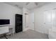 Cozy bedroom with neutral decor, desk, shelving, and ample closet space at 9148 Royal River Cir, Parrish, FL 34219