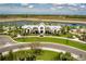 Stunning community center overlooking a serene lake, offering residents upscale amenities and picturesque views at 9148 Royal River Cir, Parrish, FL 34219