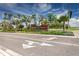 Welcome to North River Ranch: Beautiful community entrance with lush landscaping and clear signage at 9148 Royal River Cir, Parrish, FL 34219