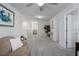 Bright loft area with comfortable seating and decor, providing a welcoming and flexible space at 9148 Royal River Cir, Parrish, FL 34219