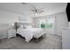 Serene main bedroom with ample natural light, neutral colors, and a cozy seating area at 9148 Royal River Cir, Parrish, FL 34219