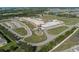 Modern school building with well-maintained grounds and ample parking, fostering an engaging learning environment at 9148 Royal River Cir, Parrish, FL 34219