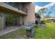 Charming back patio with a built-in grill, perfect for outdoor dining and entertaining at 933 Sunridge Way # B5, Sarasota, FL 34234