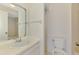 Bathroom with a neutral vanity, toilet, and shower-tub combo at 933 Sunridge Way # B5, Sarasota, FL 34234