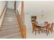 Dining room featuring a wood staircase and a view into the kitchen at 933 Sunridge Way # B5, Sarasota, FL 34234
