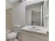 Bright bathroom with single sink vanity and shower-tub combo at 935 Sunridge Way # B4, Sarasota, FL 34234