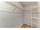 Walk-in closet with metal shelving at 935 Sunridge Way # B4, Sarasota, FL 34234