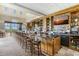 Modern bar with a large screen TV and an extensive selection of spirits and comfortable seating at 9719 Discovery Ter, Bradenton, FL 34212