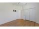 Bedroom with hardwood floors and closet at 9719 Discovery Ter, Bradenton, FL 34212