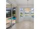Breakfast nook boasts abundant natural light and views of the pool and lush backyard at 9719 Discovery Ter, Bradenton, FL 34212