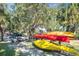 Community kayak storage area with colorful kayaks, providing convenient access for residents to enjoy water activities at 9719 Discovery Ter, Bradenton, FL 34212