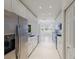 Modern kitchen featuring stainless steel appliances and white cabinets at 9719 Discovery Ter, Bradenton, FL 34212