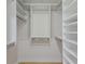 Walk-in closet with custom shelving and ample storage space at 9719 Discovery Ter, Bradenton, FL 34212