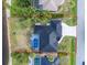 Aerial view showing the rectangular property, pool and landscaping at 10055 Franklin Dr, Englewood, FL 34224