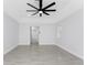 Spacious bedroom with a modern ceiling fan and recessed lighting at 10055 Franklin Dr, Englewood, FL 34224