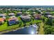 Aerial view of home featuring a pool and lush landscaping at 12520 Natureview Cir, Bradenton, FL 34212