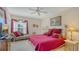 Bedroom with large bed, settee, and ample natural light at 12520 Natureview Cir, Bradenton, FL 34212
