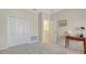 Bright bedroom featuring a closet and doorway at 12520 Natureview Cir, Bradenton, FL 34212
