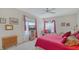 Comfortable bedroom featuring windows, a cozy bed, and ample natural light at 12520 Natureview Cir, Bradenton, FL 34212